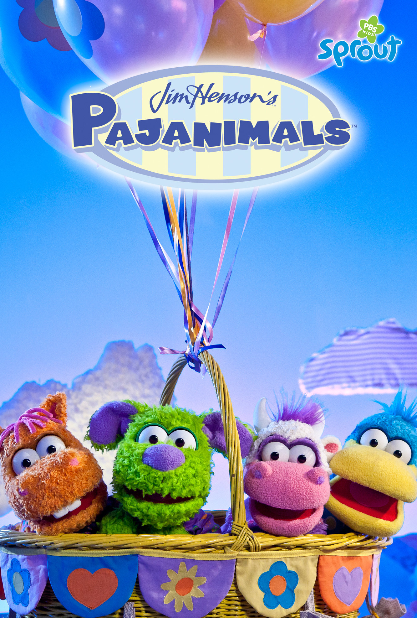 Los cuatro títeres de felpa de la serie Pijanimales dentro de una canasta de globos